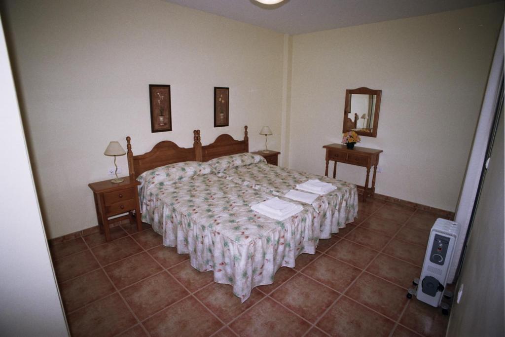 Apartamentos La Casa Del Barrio 마로 객실 사진