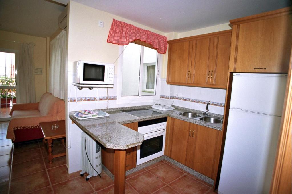 Apartamentos La Casa Del Barrio 마로 객실 사진